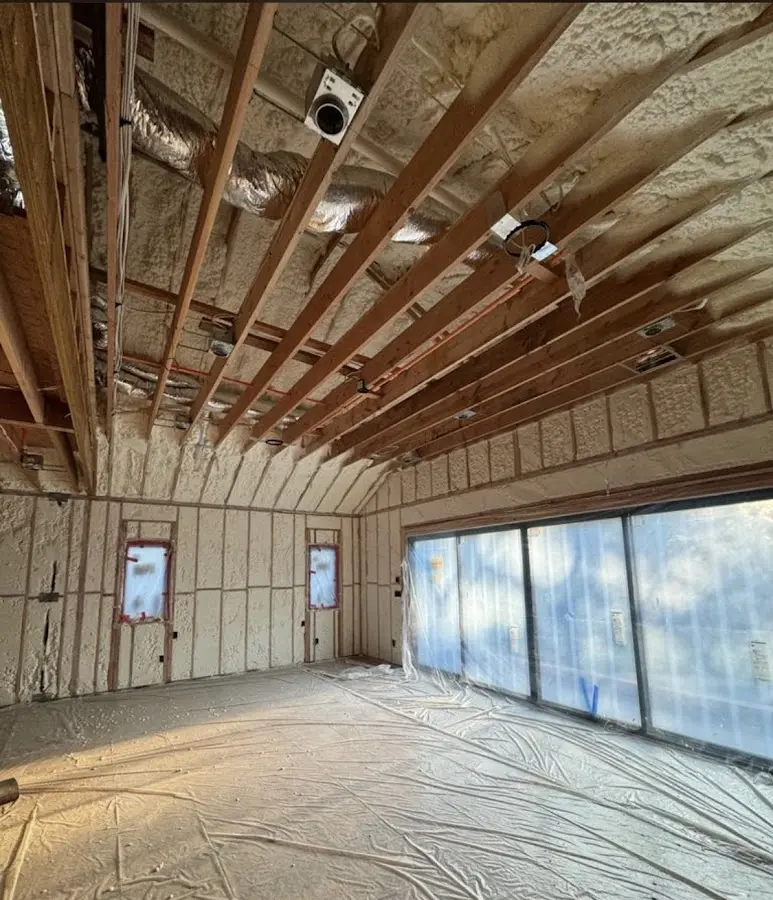 Interior walls and ceiling insulated with spray foam during new construction in North Miami Beach